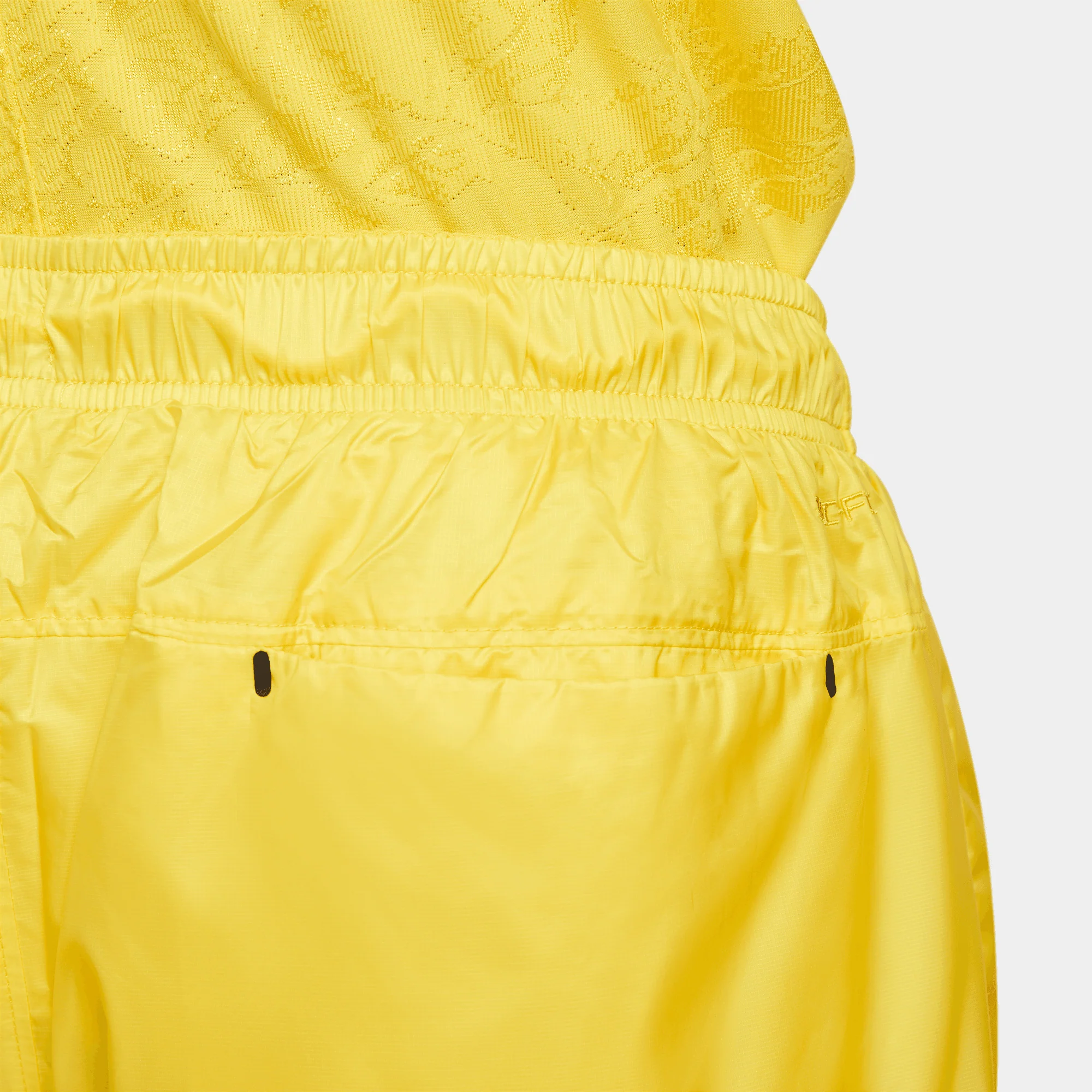 NIKE SPORTSWEAR TECH PACK SHORTS "YELLOW" - Image 4